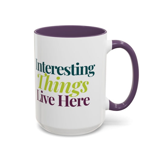 Interesting Things Live Here Mug